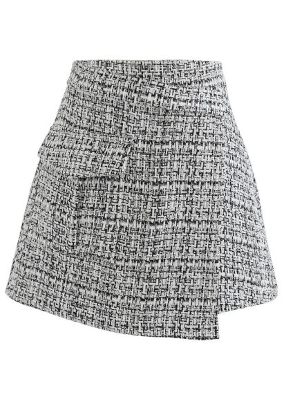 Minifalda asimétrica de tweed en negro