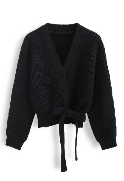 Suéter cruzado de punto grueso con lazo en negro