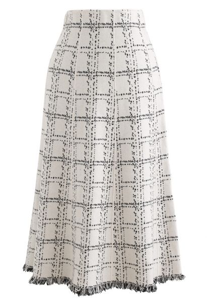 Falda de punto con dobladillo con flecos de rejilla en marfil