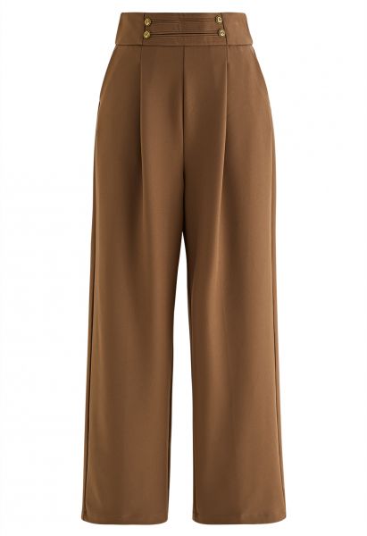 Pantalones anchos con botones dorados en marrón