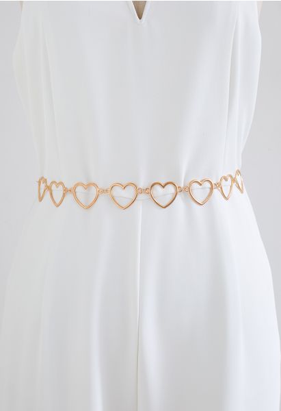 Cinturón de cadena de metal con forma de corazón dorado