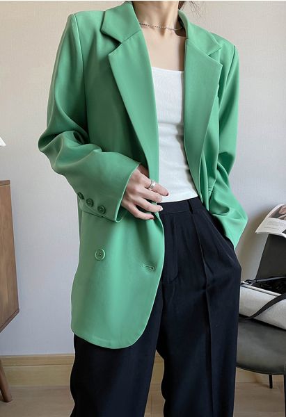 Blazer con doble botonadura y bolsillos con solapa en verde