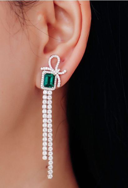 Aretes colgantes de diamantes con gema de talla esmeralda