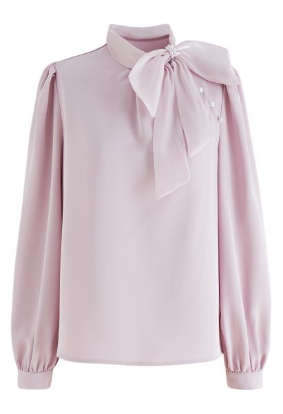 Camisa de raso de perlas con lazo de organza en rosa