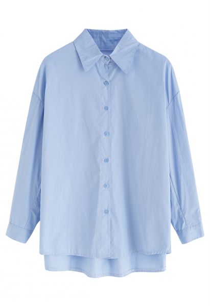 Camisa de algodón con botones y cuello en punta en azul