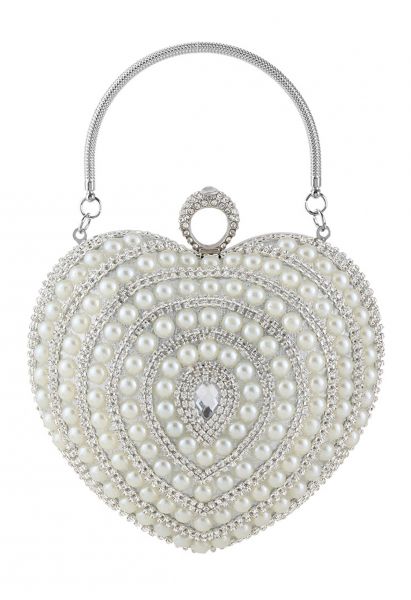 Clutch con decoración de perlas en forma de corazón en plata
