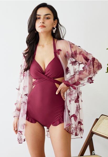 Bañador con volantes y lazo halter con kimono de malla en vino