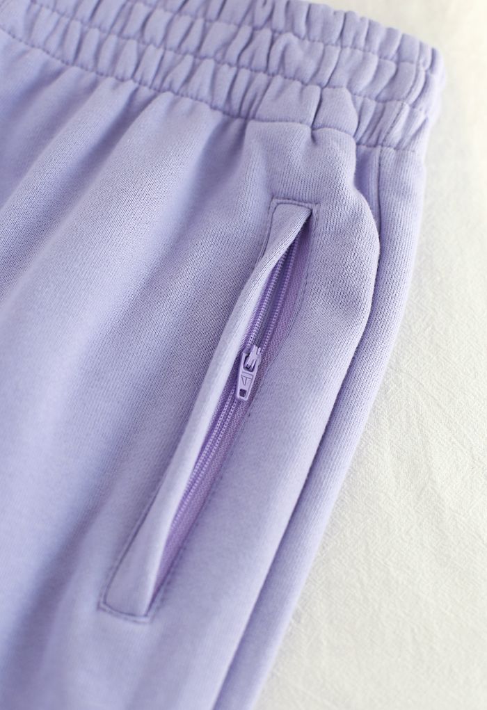 Joggers con bolsillo lateral con cremallera en lavanda