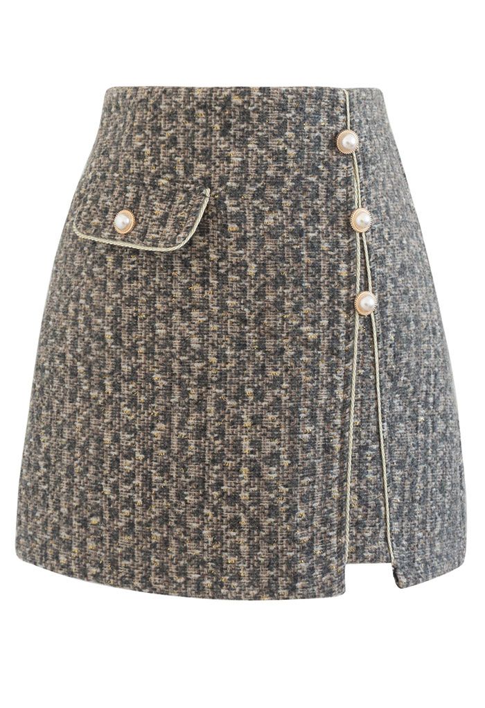 Minifalda de tweed con botones y flecos dorados en humo