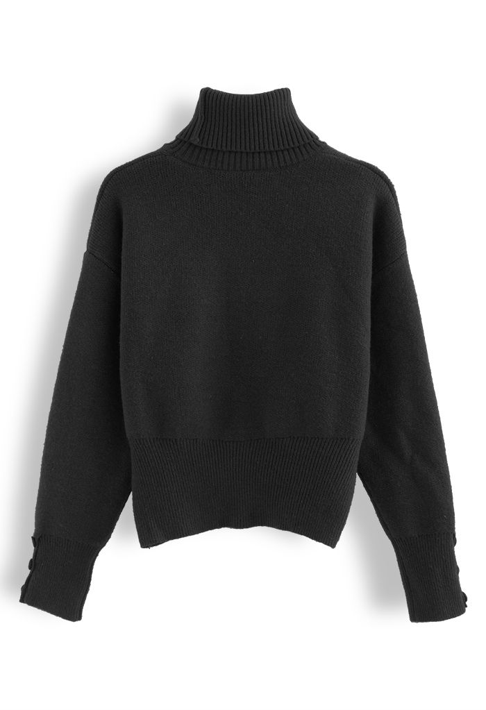 Suéter de cuello alto con ribete de botones en negro