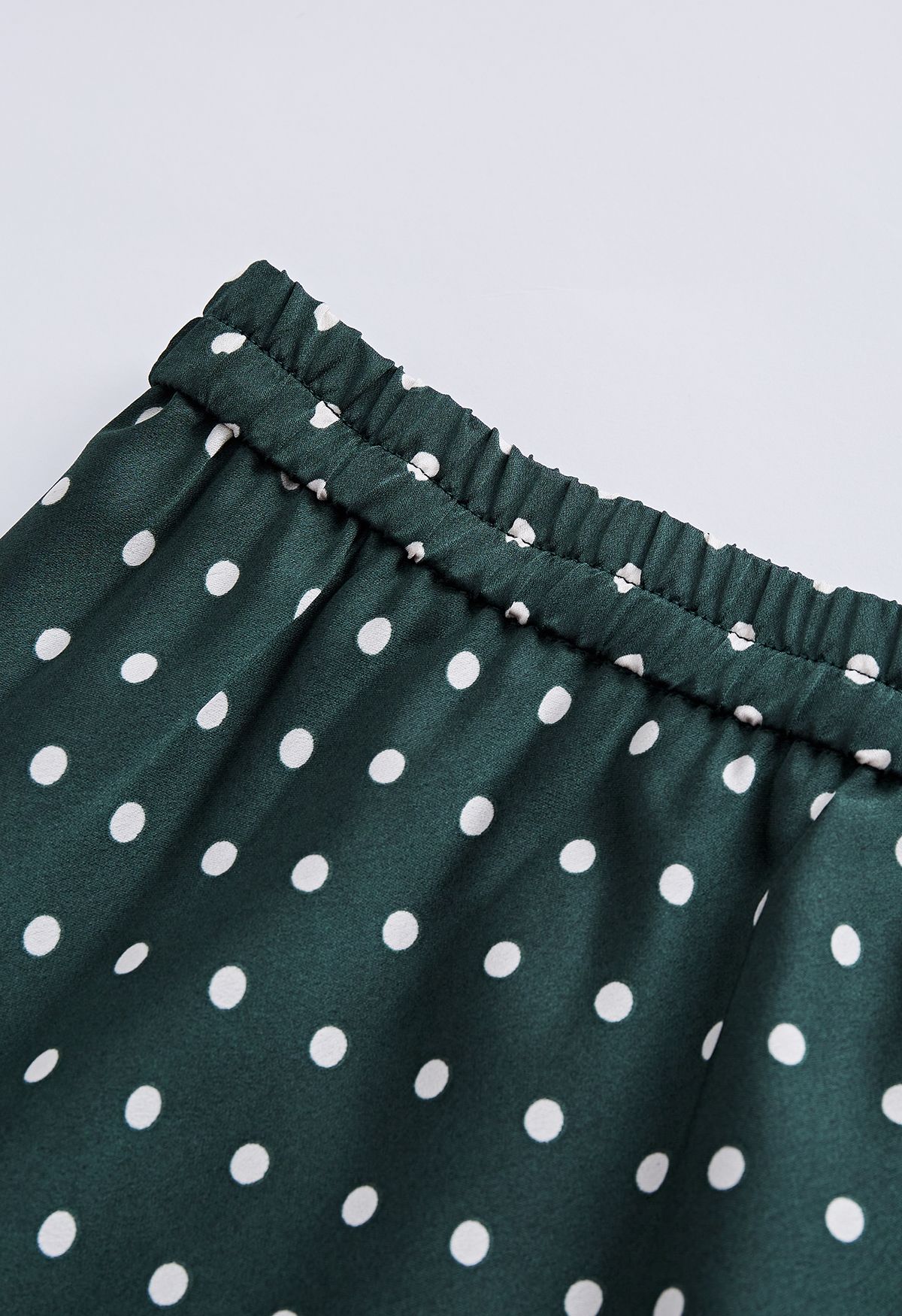 Falda midi con volantes y estampado de lunares