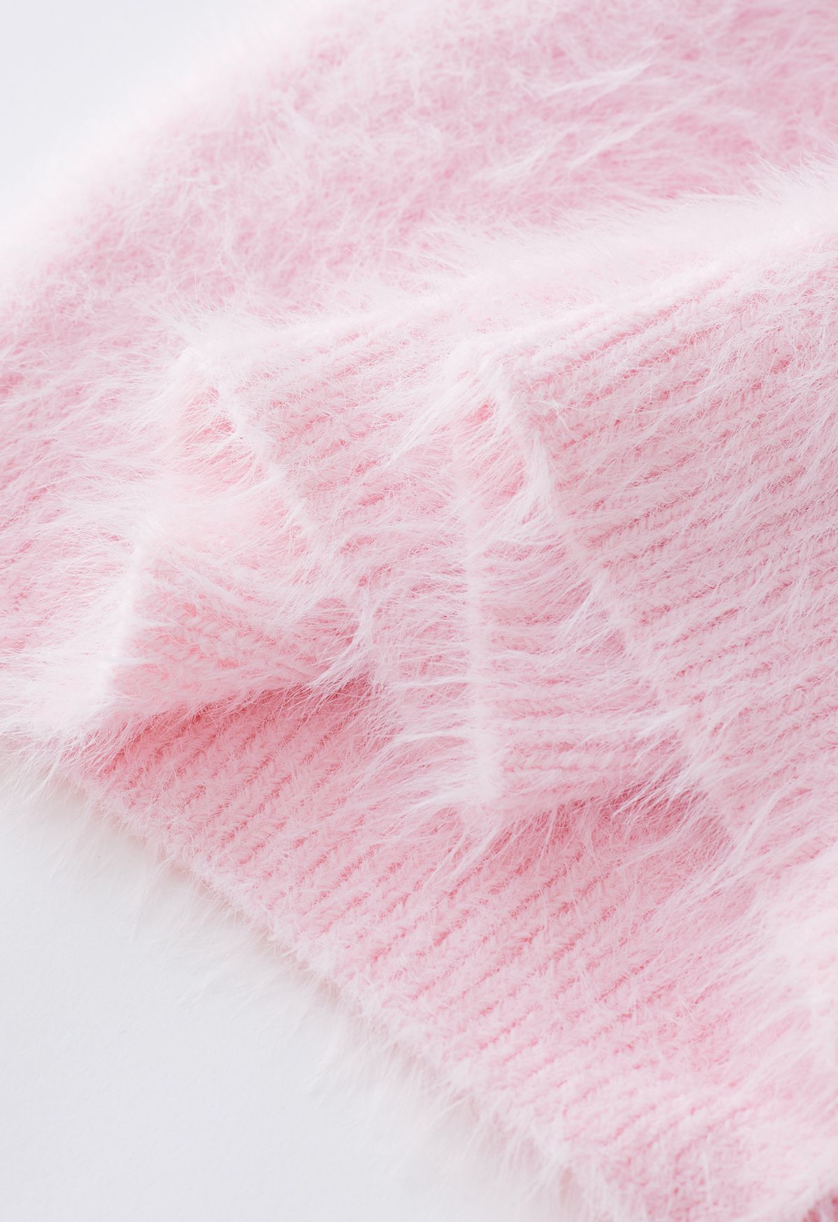 Cárdigan corto abotonado con lentejuelas y cuello en V esponjoso en rosa