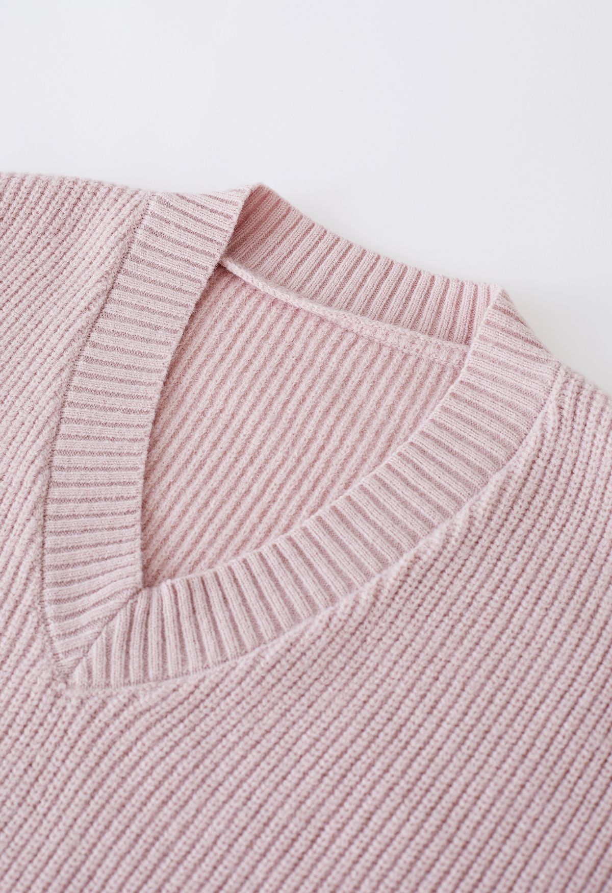 Suéter de punto acanalado con bufanda desmontable en rosa polvoriento