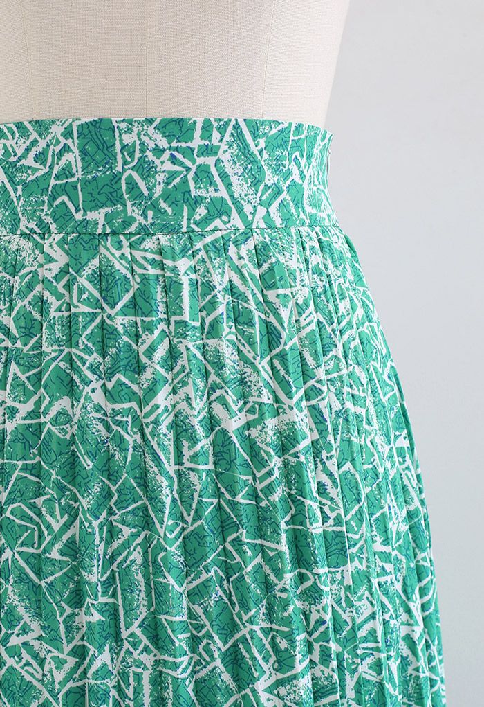 Falda larga asimétrica plisada de línea irregular en verde