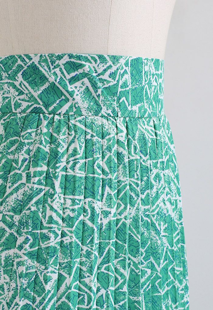 Falda larga asimétrica plisada de línea irregular en verde