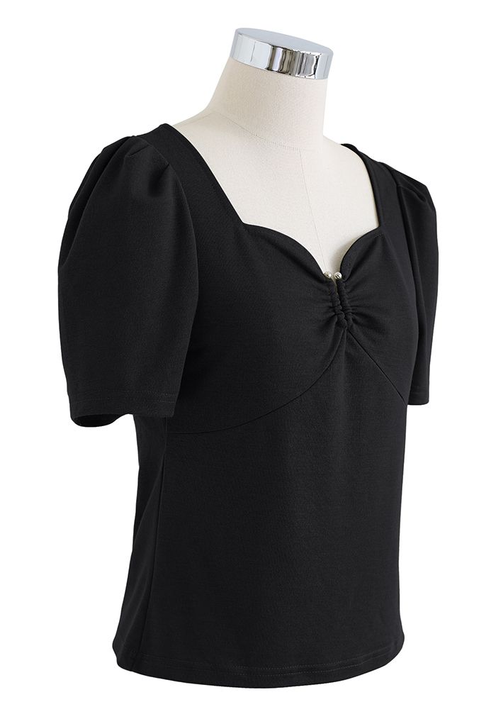 TOP METALIZADO EN FORMA DE U CON CUELLO AMORTIGUADO EN NEGRO