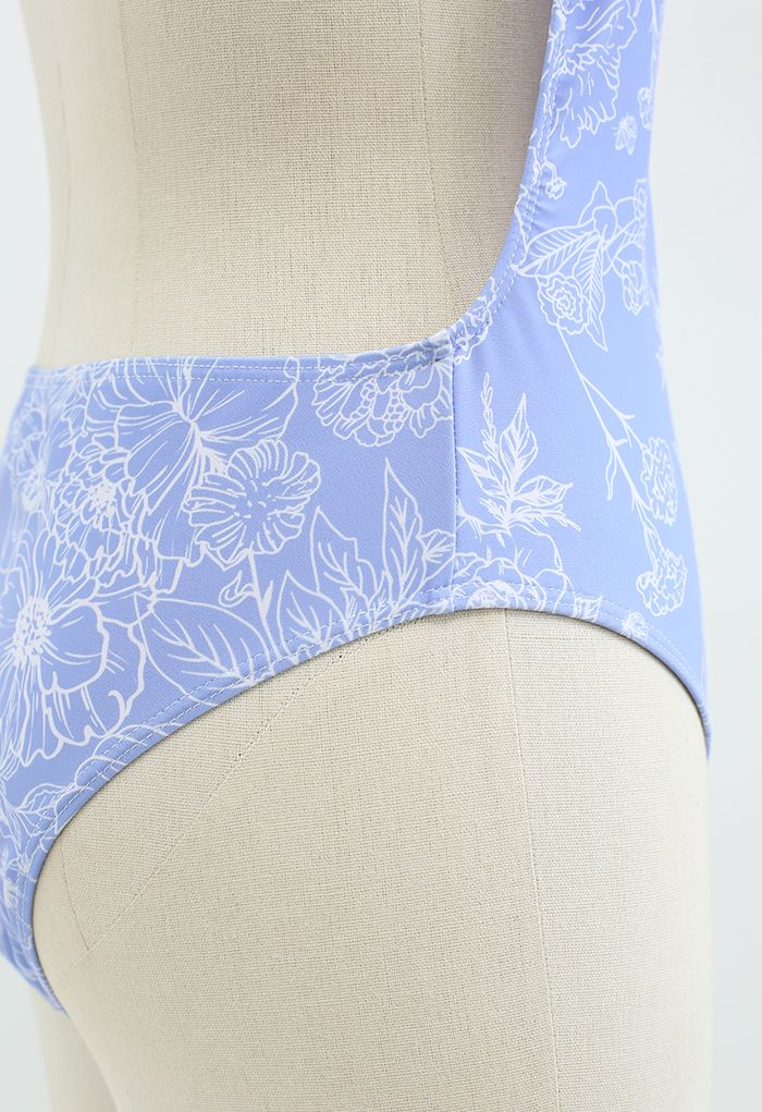 Bañador floral con espalda abierta y dibujo floral en azul