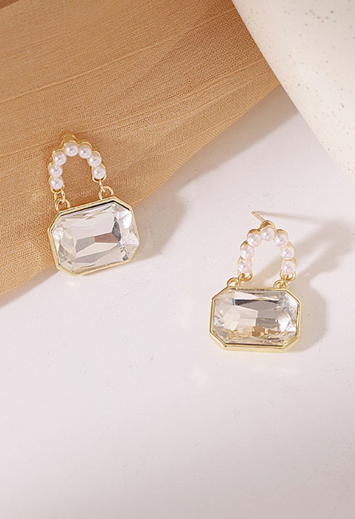 Aretes de perlas con candado de cristal