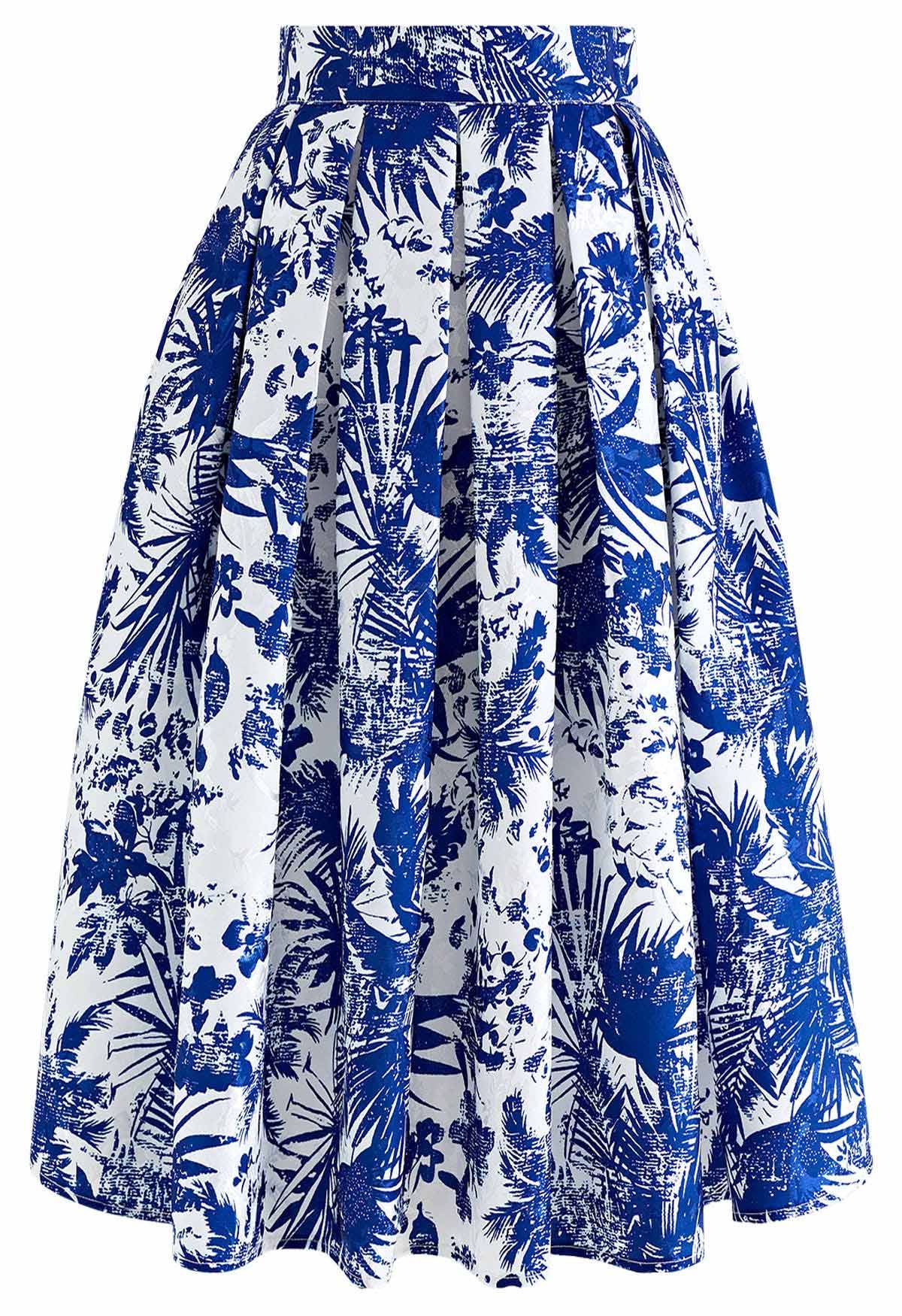 Falda midi plisada de jacquard con surcos tropicales en azul marino