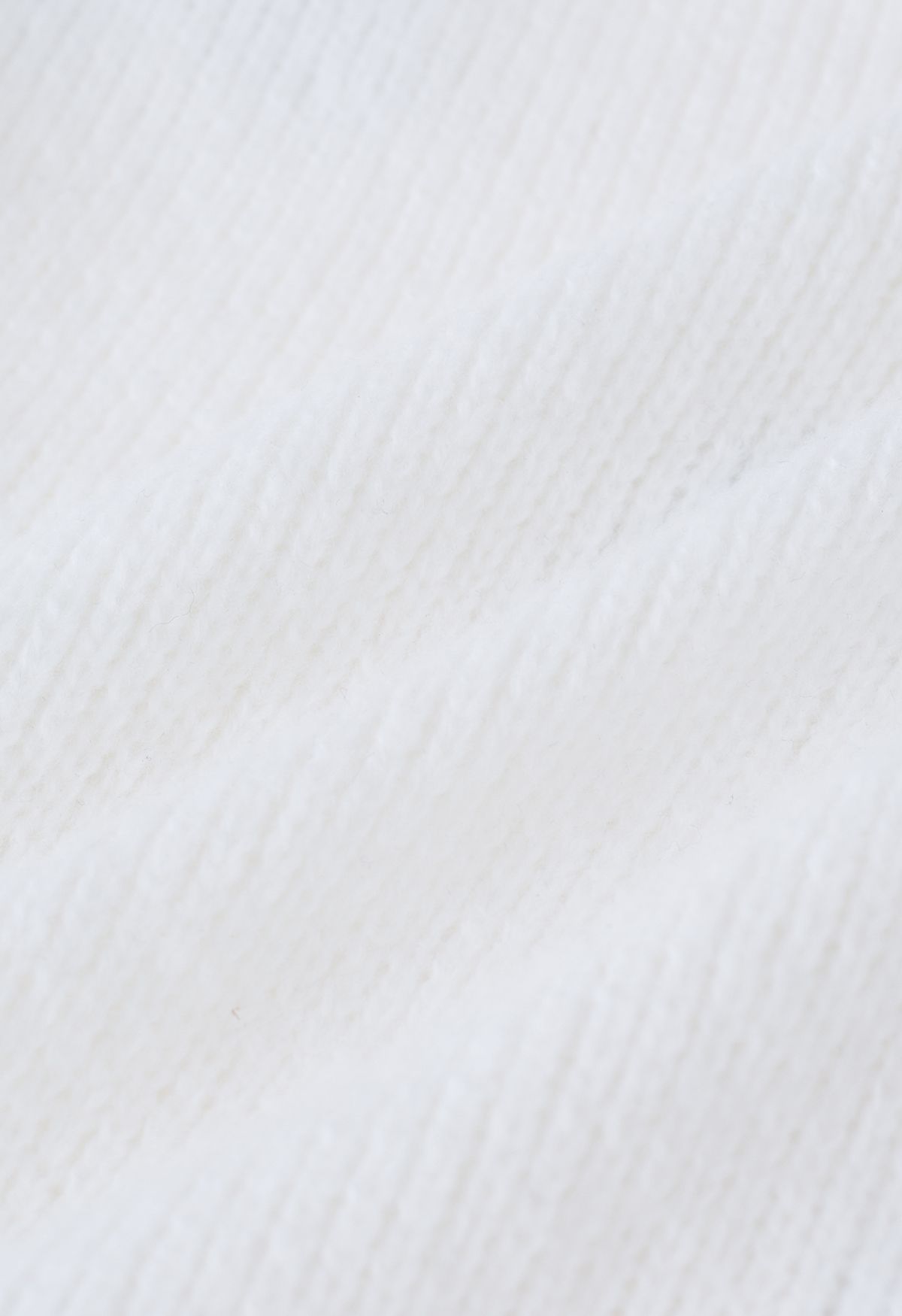 Suéter de punto de manga corta adornado con lazo en blanco