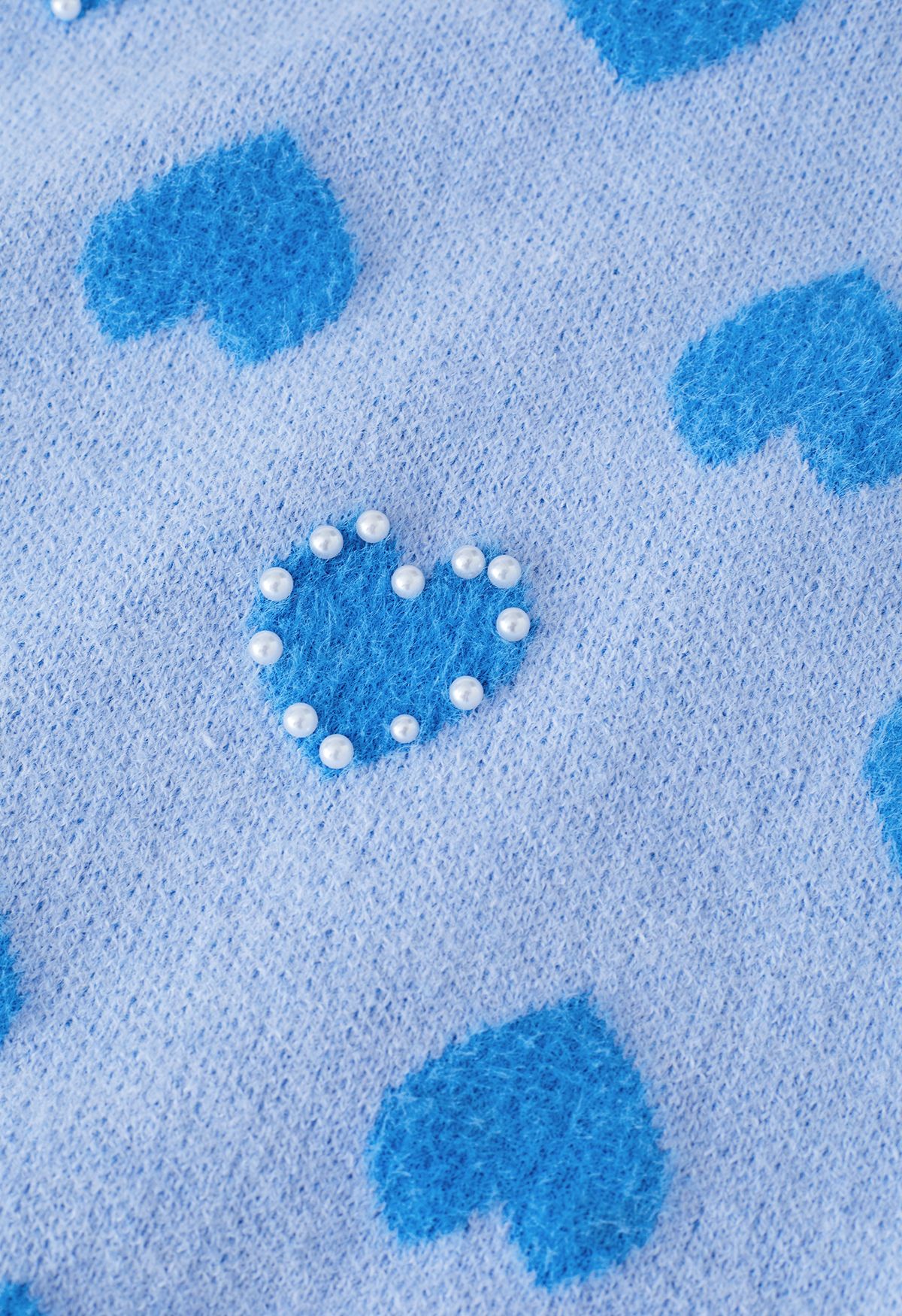 Suéter de punto de corazón esponjoso con ribete de perlas en azul
