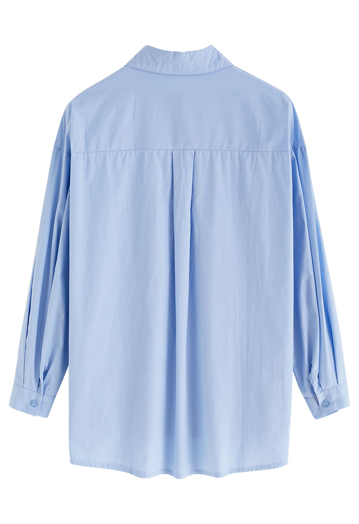 Camisa de algodón con botones y cuello en punta en azul