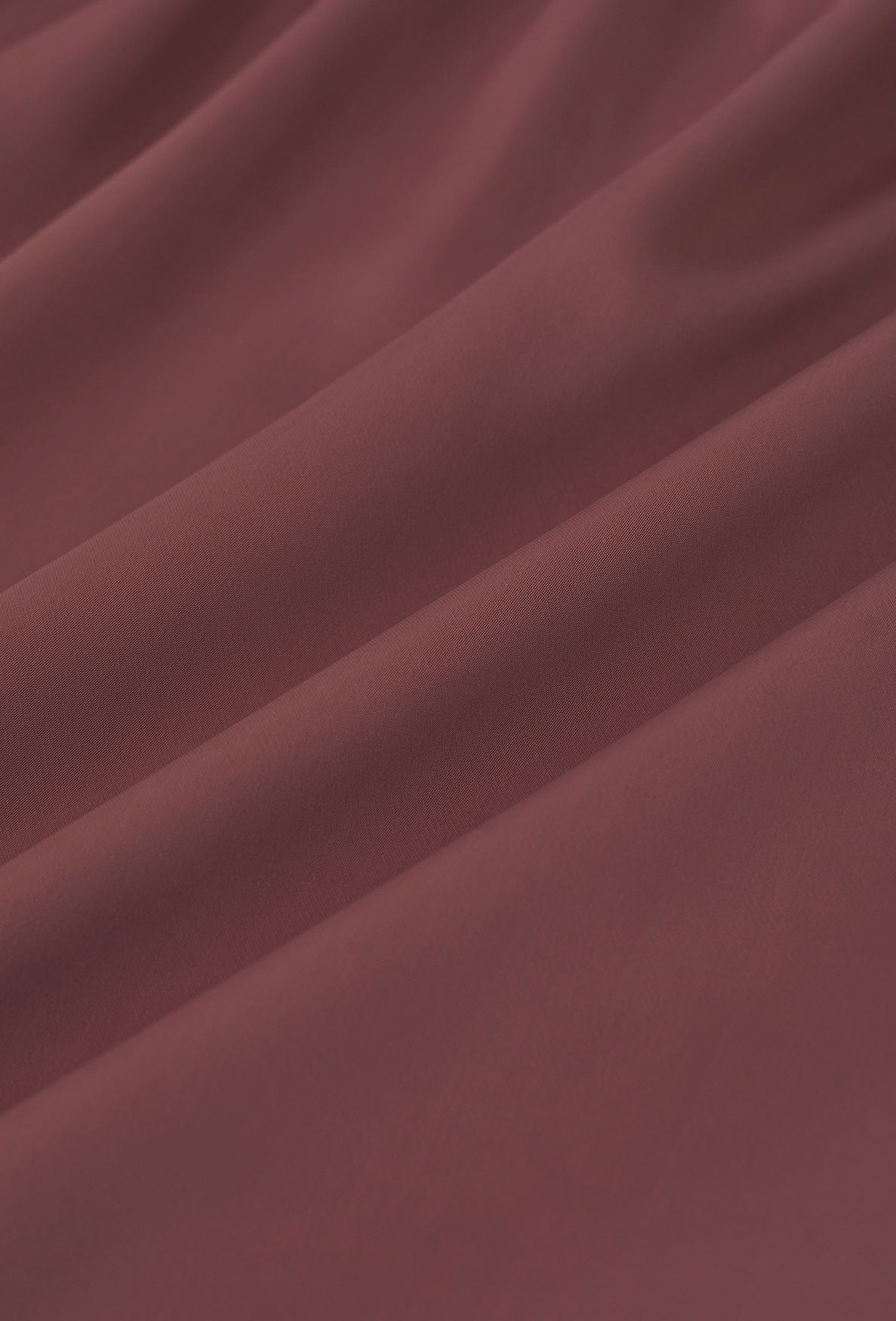 Falda midi de satén asimétrica con volantes en rojo óxido