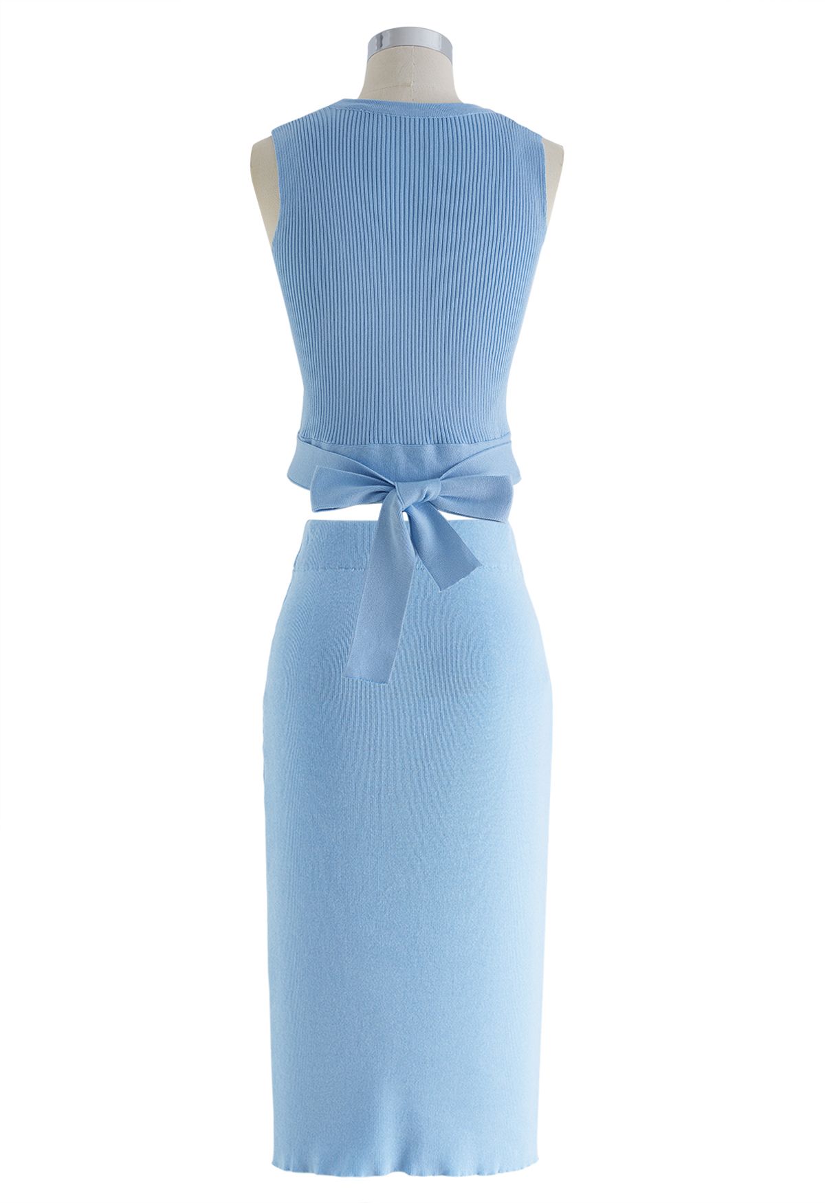 Conjunto de top de punto con lazo en la cintura y falda lápiz en azul