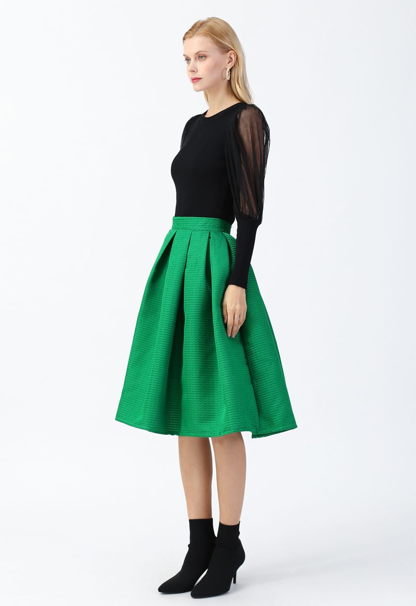 Falda midi plisada con textura ondulada en verde