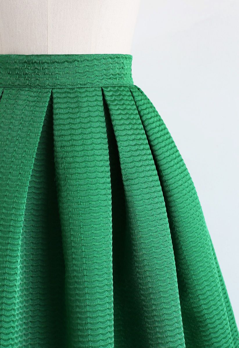 Falda midi plisada con textura ondulada en verde