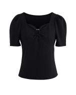 TOP METALIZADO EN FORMA DE U CON CUELLO AMORTIGUADO EN NEGRO