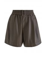 Shorts de cuero sintético con botones texturizados en marrón
