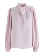 Camisa de raso de perlas con lazo de organza en rosa