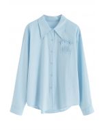Camisa de algodón con parche plisado en azul
